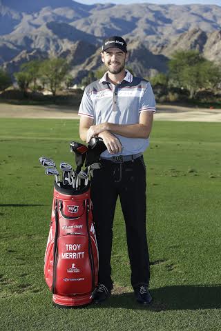 Troy Merrit signs for Wilson Golf